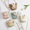 Handmade woven straw crossbody bags for kids with delicate floral accents in five colors - Lily of the Valley Bead Flower / Khaki