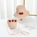 Pink straw sun hat and matching crossbody bag set with cute strawberry patches for girls - Pink