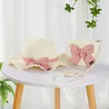 Detail of handmade bow on girls straw sun hat and matching crossbody bag set - S Kids Size / Lotus Leaf Hat and Bag Set / Cream