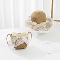 Detail of child straw sun hat and matching bag set with white lace and ribbon bow - Kids (52cm Hat Only) / Khaki (Ruffle)