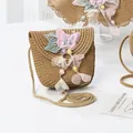 Detail view of woven straw shoulder bag with pink sequined butterfly and floral charms - Butterfly Bead Flower / 15*13cm / Khaki
