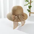 Detail of a natural woven straw sun hat with a large decorative bow for summer - M (Adult) / Large Brim Style / Large Brim Khaki