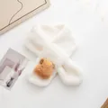 Detail of soft white plush scarf featuring a cute brown bear cartoon decorative element - Off White