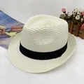 Detailed view of beige straw sun hat with black ribbon and fine woven natural texture - S Kids (52cm) / Cream