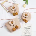 Mini stro schoudertas voor meisjes met 3D bloem accenten en een schattige pompon kwast - Roze - Rasterbal Beige Bloem