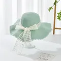 Light green wide brim straw sun hat featuring elegant white lace bow with floral embroidery - S Kids / Grid Bow Ribbon (Ruffled Edge) / Green
