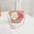 Detail of pink straw crossbody bag with knitted flowers and golden Sweet lettering - SWEET White Pink Flowers / Pink