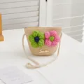 Detail view of woven straw bag featuring 3D crochet flowers and secure metal zipper - SWEET Green Pink Flowers / Beige