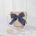 Kids woven straw crossbody bag with navy blue bow and white cotton rope shoulder strap - Single Bag / Pink