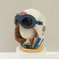 Detailansicht des dicken braunen Fleecefutters und der Fliegerbrille an der Kindermütze - 2-12 Jahre / Weiß und Blau