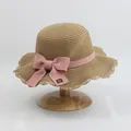 Straw sun hat for girls with pink ribbon and bow on a natural wood hat stand - S Kids Size / Lotus Leaf Single Hat / Khaki