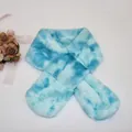 Detail view of blue and white tie-dye plush faux fur scarf for children with floral accent - Blue Tie-Dye