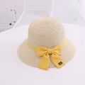 Beige woven straw sun hat for girls featuring a bright yellow ribbon handmade bow - S Kids Size / Wide Brim Single Hat / Beige