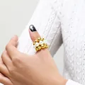 Detailed view of layered gold beads and white pearls ring on a textured knit background - Multi-layer Beaded Style (Style 1) / US 7 / Gold