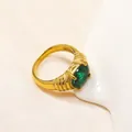 Anello vintage in titanio dorato con zircone verde ovale e fascia a trama intrecciata - Oro Verde