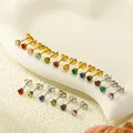 Détail d'un ensemble de clous d'oreilles couronne en zircone colorée avec bases dorées et argentées - 4mm / Argent Avec Zircone Rose
