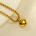 Detail of a polished gold heart-shaped pendant with a robust box chain necklace - Pendant Only (No Chain) / Gold