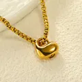 Detailed view of heart-shaped gold-plated urn necklace with round box chain - Pendant Only (Without Chain)