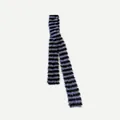 Fuzzy striped knit scarf in black and lilac faux fur with a soft texture - Black Purple