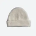 Winter seamless off-white wool blend beanie with thick fuzzy texture and folded cuff - Off-white