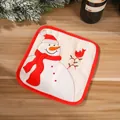 Agarrador con bordado de muñeco de nieve sobre mesa de madera para decoración navideña - Agarrador Muñeco de Nieve