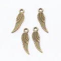 Set of four vintage zinc alloy wing pendants in antique bronze finish for jewelry making - Antique Bronze