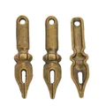 Detailed macro view of vintage bronze pen nib shaped metal pendants with antique texture - Antique Bronze