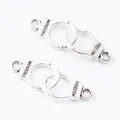 Vintage silver zinc alloy handcuffs charm with engraved Freedom text for DIY jewelry - 30x10mm / Antique Silver