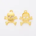 Detailed macro view of gold skull pendants with heart-shaped eyes for DIY jewelry - Gold