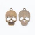 Antique bronze skull pendants in vintage alloy style for DIY jewelry making and crafts - Antique Bronze