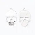 Front and back view of vintage skull pendants in silver-tone zinc alloy for jewelry DIY - Antique Silver