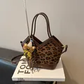 Leopard print horsehair and brown leather bucket bag with a cute bear charm and V-shaped top - With Pendant / Leopard Coffee