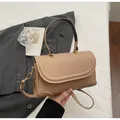 Chic apricot faux leather crossbody bag with rounded flap and golden hardware - Khaki