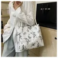 White tote bag with black butterfly prints and white braided rope handles for women - 29*12*28 / Black