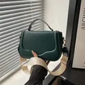 Dark green matte leather handbag with wavy edge flap and wide cream fabric strap - Green