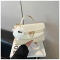 Minimalist beige crossbody square bag with gold buckle and fuzzy monster keychain - Beige (With Pendant)