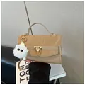 Minimalist beige PU leather handbag with pleat texture, gold chain and white plush charm - Khaki (With Charm)