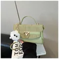 Fashion mint green crossbody bag with gold lock and plush monster charm detail - Green (With Pendant)