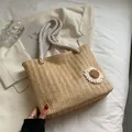 Large woven tote bag in khaki with a 3D white daisy ornament and rope top handles - Khaki