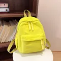Small corduroy backpack in bright yellow-green with a textured fashion design - Yellow