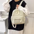 Mini corduroy backpack in off-white finish featuring fashion label and side pockets - Off White