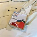Minimalist canvas tote bag featuring orange fruit print and rustic rope handles - Orange Drink Theme (Style 2)