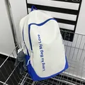 Blauw-witte rugzak met grote capaciteit, letterprint en grijze pluche kikker hanger - Blauw