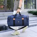 Large capacity navy blue waterproof nylon travel bag with crossbody strap and GIM label - Blue