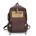 Bruine canvas rugzak met vintage patches en lederen biezen voor reizen en school - koffiekleur