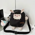 Simpatica borsa a tracolla a pecora nera con ciondolo in peluche e tracolla regolabile - Con Ciondolo / Nero