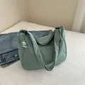 Green corduroy tote bag with side puppy charm and wide strap for daily school use - Light Green