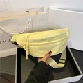 Light yellow nylon crossbody chest bag with woven zipper pull and adjustable strap - Yellow