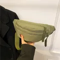 Olive green nylon crossbody chest bag with adjustable strap and woven zipper pullers - Green