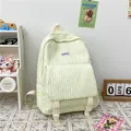 Minimalist cream bubble textured backpack with adjustable buckles in casual campus style - Yellow